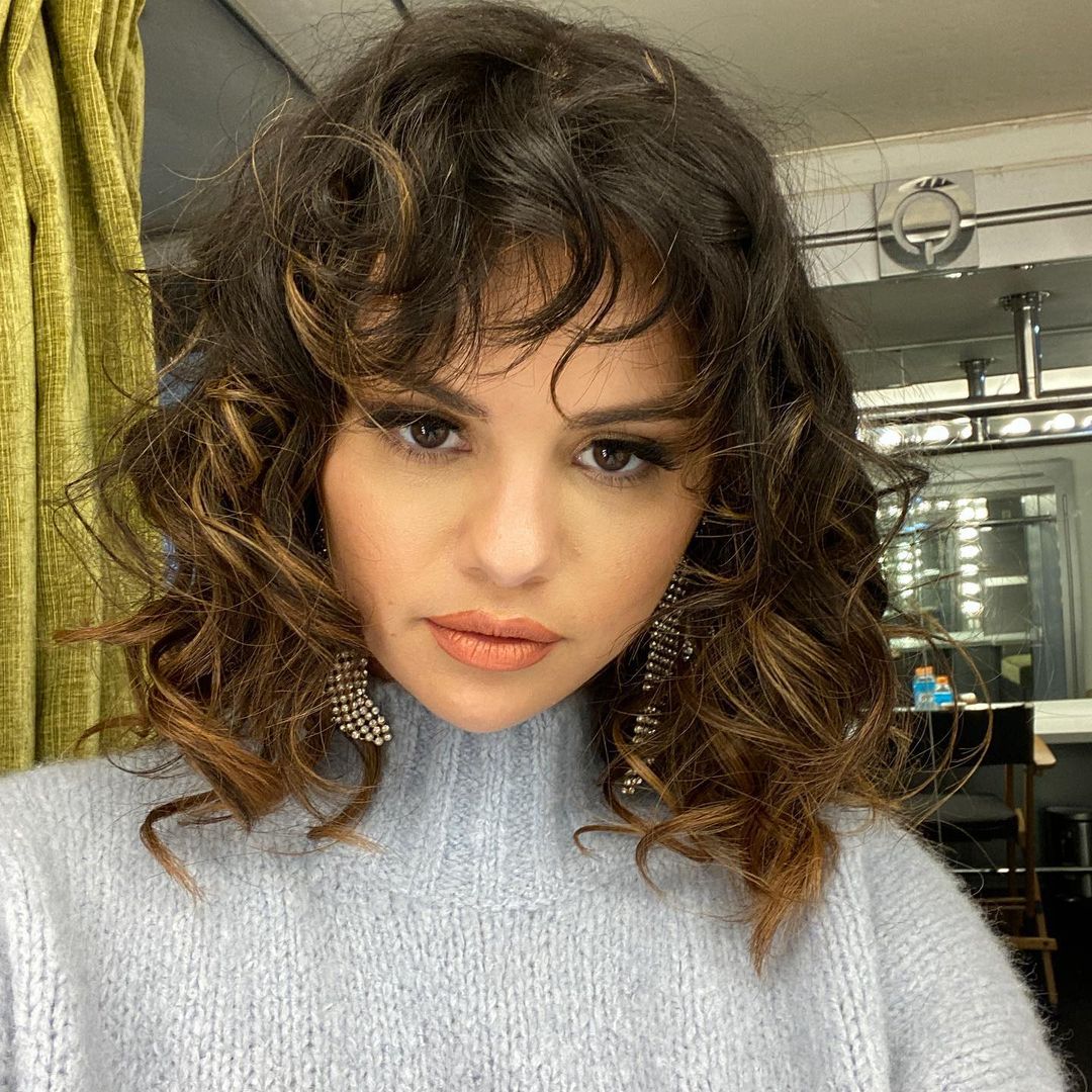 selena gomez with 70s style bangs